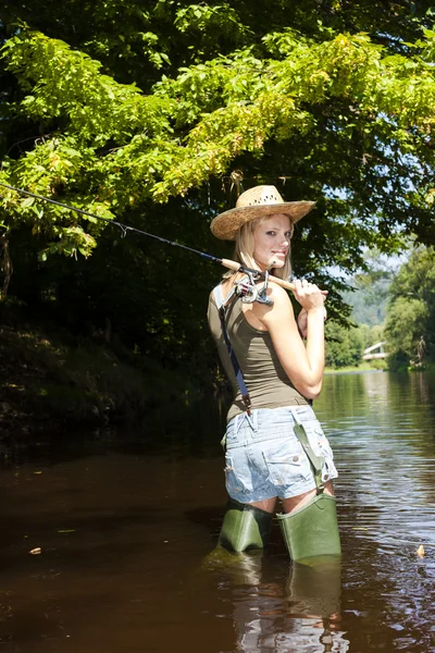 Woman fishing — Stock Photo, Image