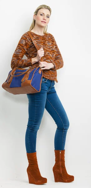 Standing woman wearing fashionable platform brown shoes with a h — Stock Photo, Image