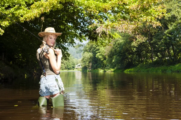 Woman fishing in Jizera river, Czech Republic — Stock Photo, Image