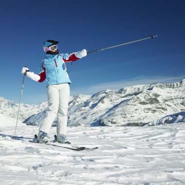 woman skier, Alps Mountains, Savoie, France clipart