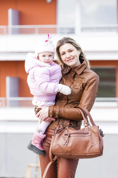 Portrait of mother with little daughter — Stock Photo, Image