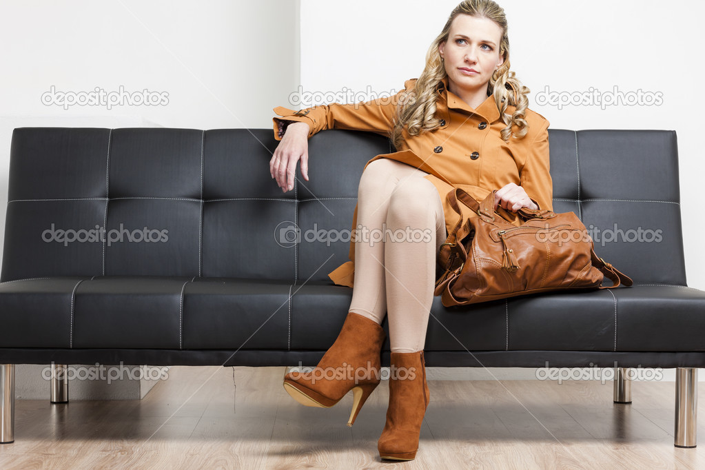 Woman in brown coat