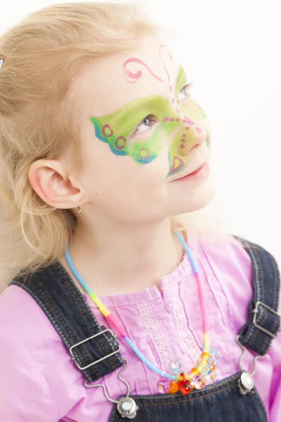Portrait of little girl with face painting — Stock Photo, Image