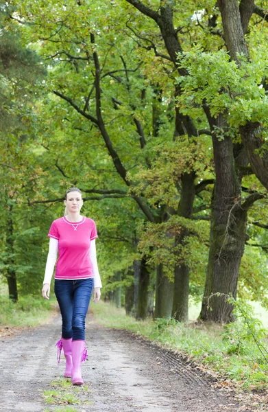 Woman wearing rubber boots — Stock Photo, Image