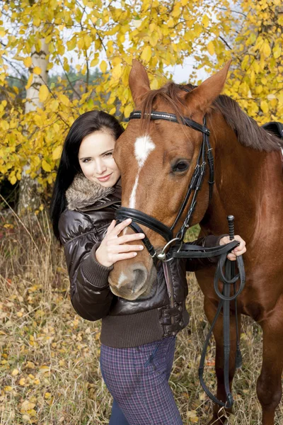 Equestrian with her horse — Stock Photo, Image