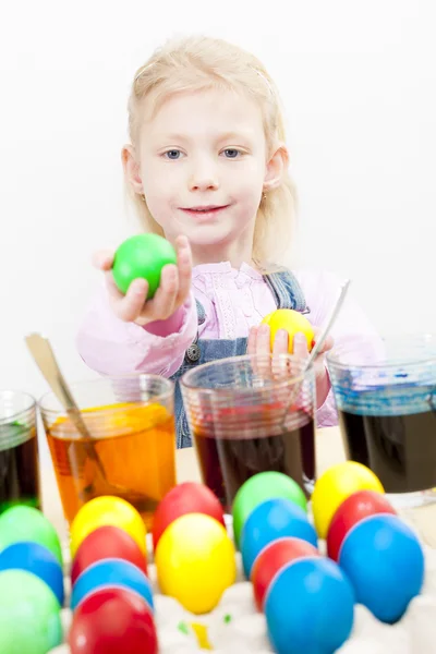Girl during Easter eggs coloration — Stock Photo, Image