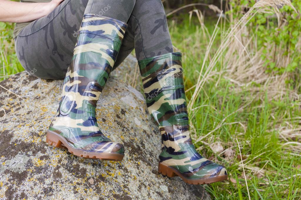 Woman wearing rubber boots Stock Photo by ©phb.cz 41600989