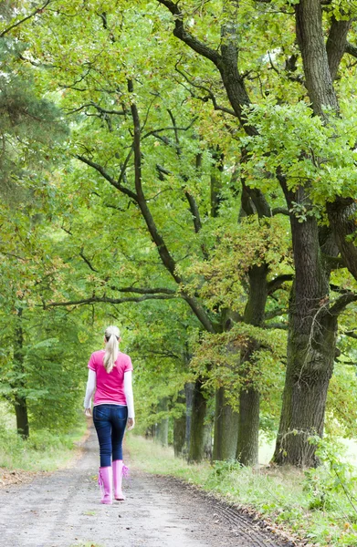 Woman wearing rubber boots — Stock Photo, Image