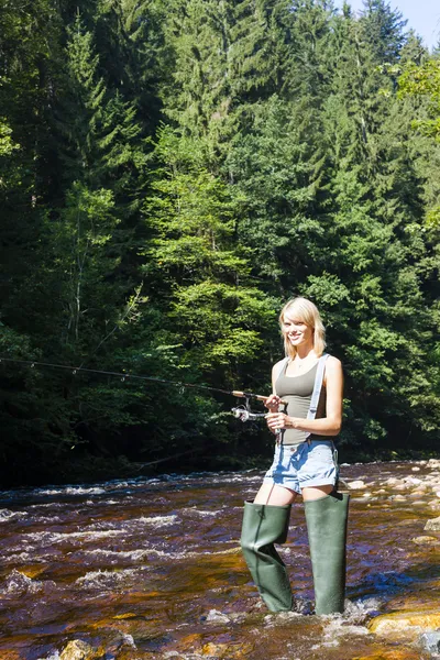 Woman fishing in Jizera river — Stock Photo, Image