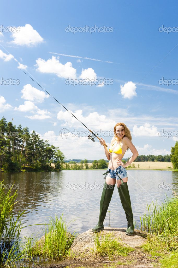 Young woman fishing — Stock Photo © phb.cz #44598457
