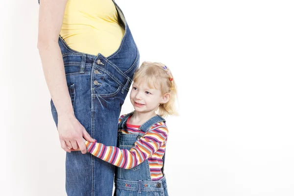 Girl hugging her mother — Stock Photo, Image