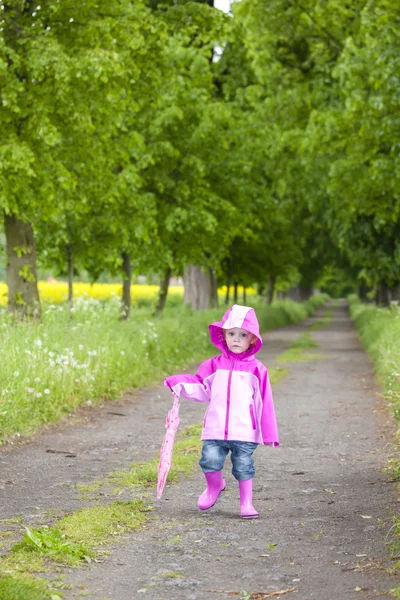 Girl in boots with umbrella — Stock Photo, Image