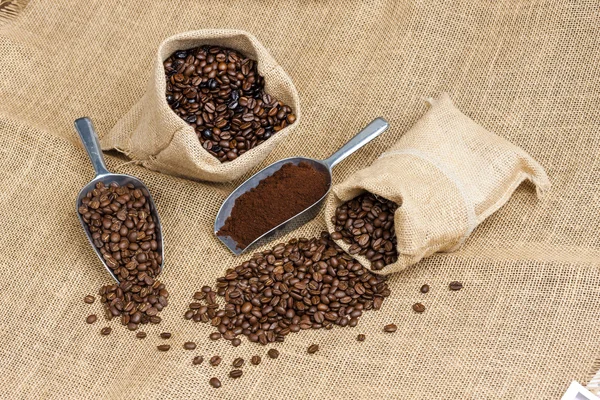 Coffee beans in jute bags — Stock Photo, Image