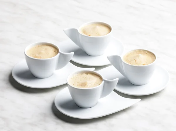 Vier kopjes koffie — Stockfoto