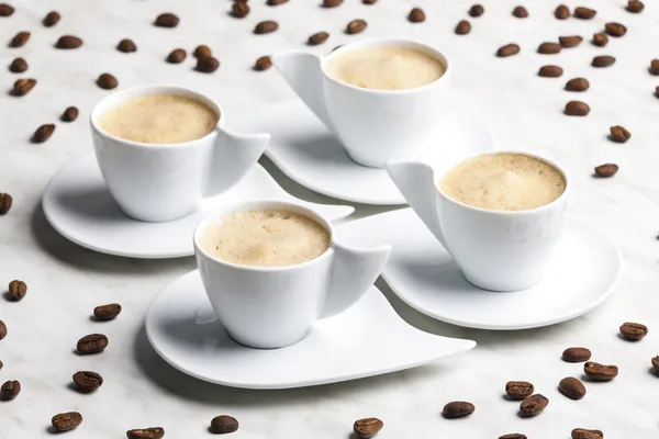 Quattro tazze di caffè — Foto Stock