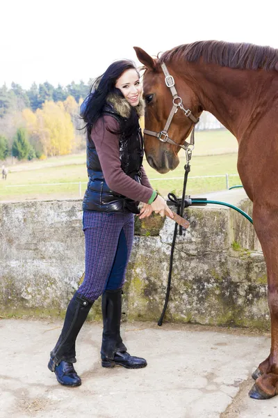 Equestrian with her horse — Stock Photo, Image