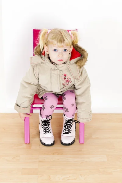 Little girl wearing a coat — Stock Photo, Image