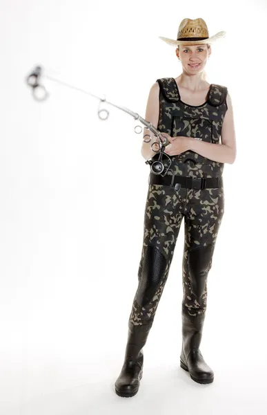 Fisher woman with fishing rod in studio — Stock Photo, Image