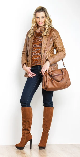 Woman wearing fashionable brown boots — Stock Photo, Image