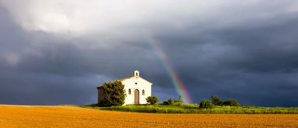 Chapel with rainbow — Stock Photo, Image