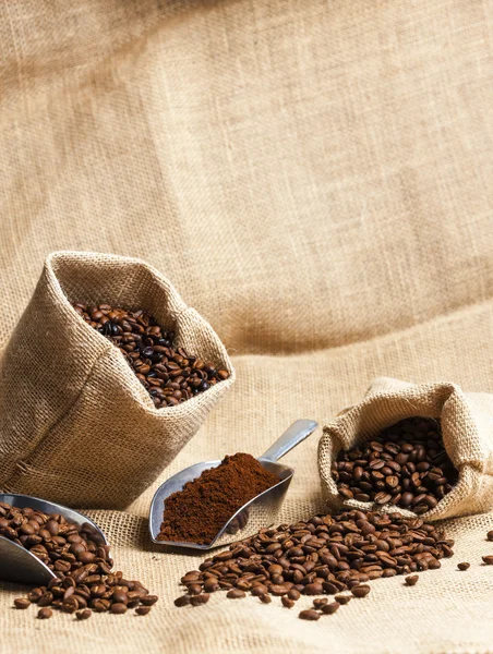 Coffee beans in jute bags — Stock Photo, Image