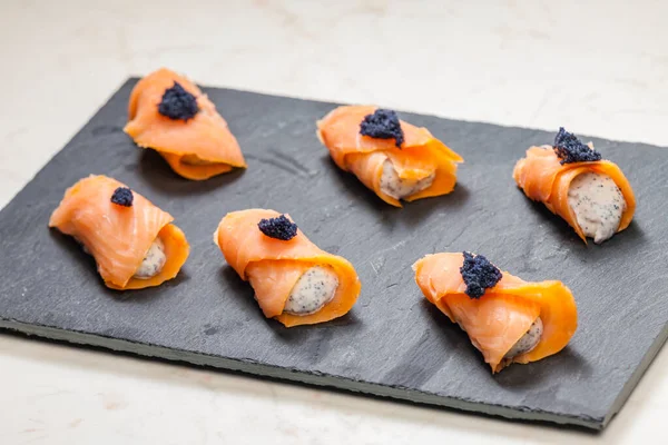 Smoked Salmon Rolls Filled Cream Cheese Black Caviar — Stock Photo, Image