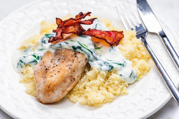 Poultry Breast Spinach Creamy Sauce Bacon Served Couscous — Stock Photo, Image