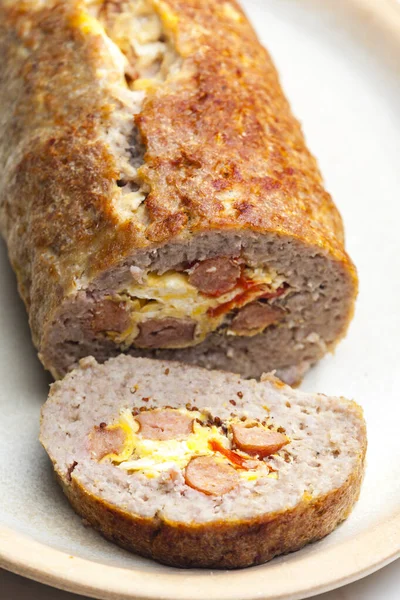homemade meat loaf filled with egg and sausage