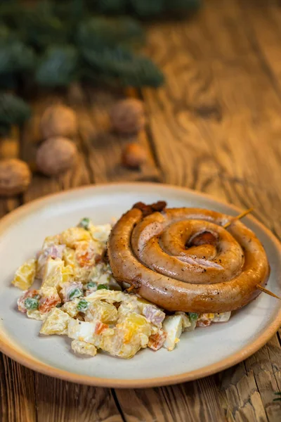 Traditional Christmas food in Czech Republic - white sausage with potato salad