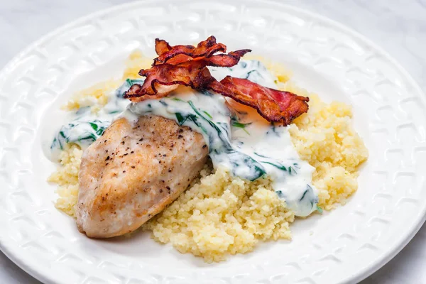 Poultry Breast Spinach Creamy Sauce Bacon Served Couscous — Stock Photo, Image