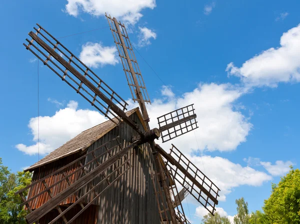 Windmill on blue sky background Stock Photo