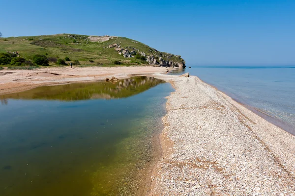 Barra de areia na costa do mar — Fotografia de Stock