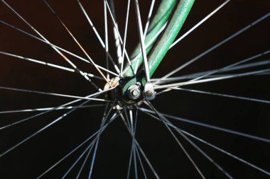 view of a old spoked bicycle wheel