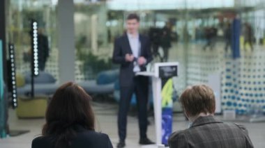 Audience and speaker during business conference