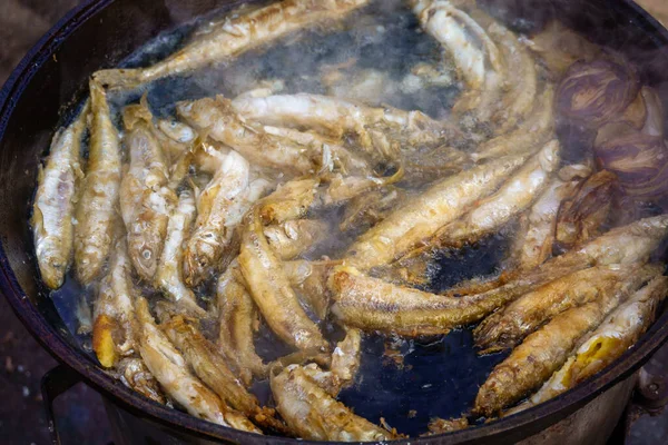 Deep fried fish in pot — Stock Photo, Image