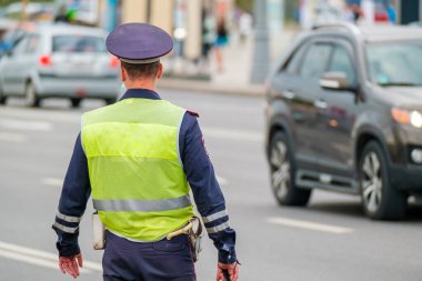 Traffic officer standing near road