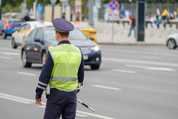 Traffic officer standing near road