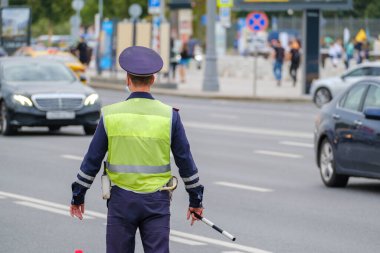 Traffic officer standing near road