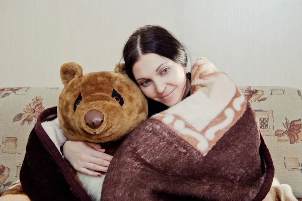 Woman with teddy bear — Stock Photo, Image