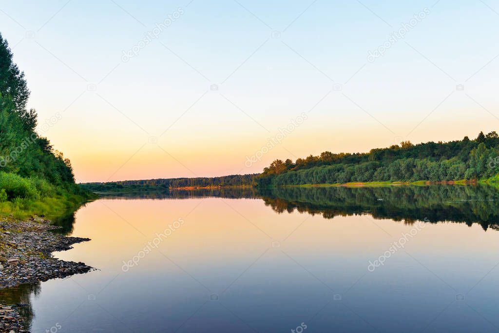 calm vyatka river at dawn on a summer morning