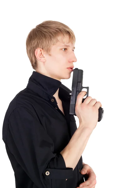 Boy with the pistol in his hand — Stock Photo, Image