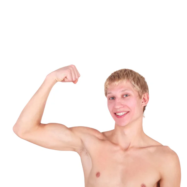 Knappe jonge kerel tonen zijn spieren glimlachen — Stockfoto