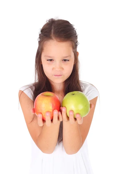 Девушка с двумя яблоками — стоковое фото