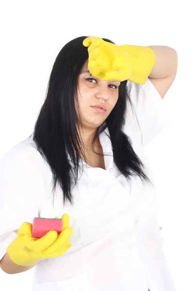Flickan i de vita uniform och gula gummihandskar — Stockfoto