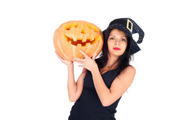 Witch with the Halloween pumpkin — Stock Photo, Image