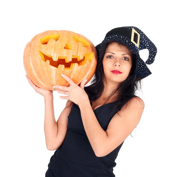 Witch with the Halloween pumpkin — Stock Photo, Image