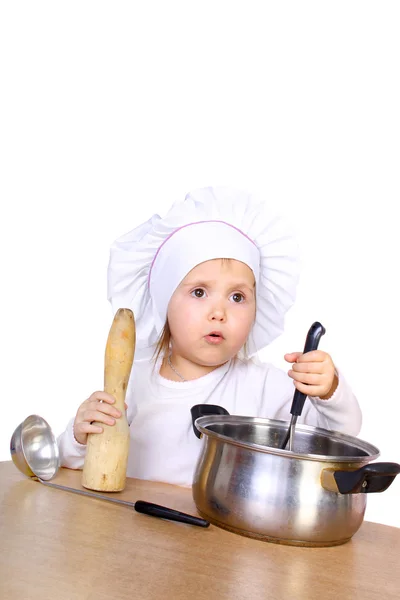 Pequeno bebê cozinhar algo — Fotografia de Stock