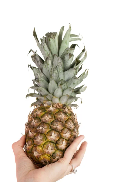 Ręka z ananasem — Zdjęcie stockowe