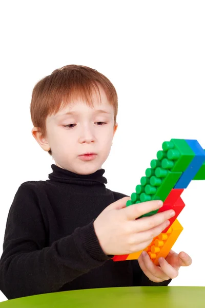 Boy playing with bricks — Stock Photo, Image