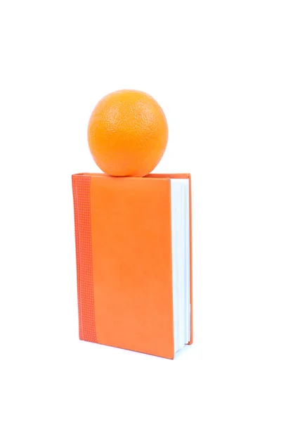 Оранжевый на дневнике — стоковое фото